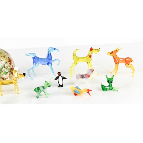 220 - A group of glass animal figures including Murano coloured glass examples, Langham glass duck form pa... 