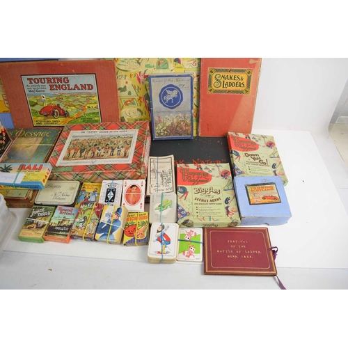 22a - A group of vintage toys to include The Victory Jig Saw puzzle, Touring England Map Game, various car... 