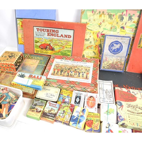 22a - A group of vintage toys to include The Victory Jig Saw puzzle, Touring England Map Game, various car... 