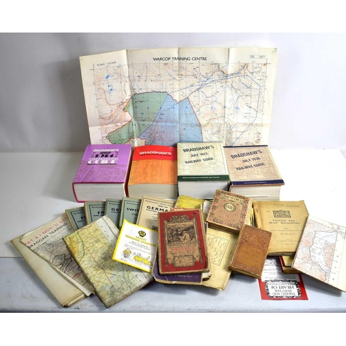 254 - A group of Bradshaw's Railway Guides together with various vintage maps to include military examples... 