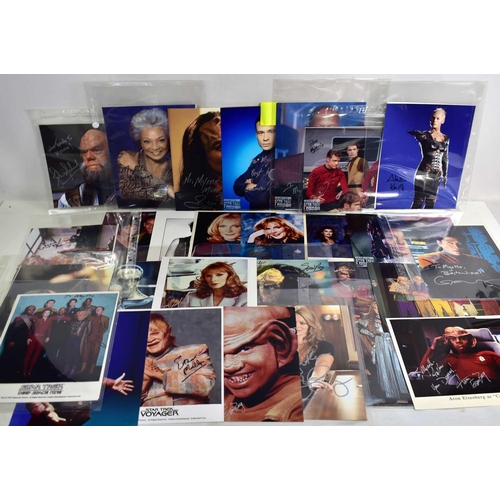 31 - Autographs: A collection of Star Trek related signed photographs to include Alice Krige, René Auberj... 