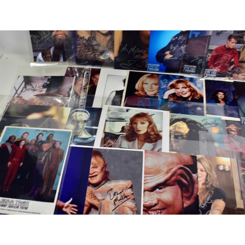 31 - Autographs: A collection of Star Trek related signed photographs to include Alice Krige, René Auberj... 