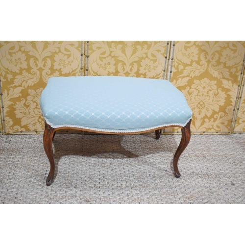 374 - A 19th century style mahogany foot stool with upholstered top and shaped cabriole legs, 46cm 80cm.