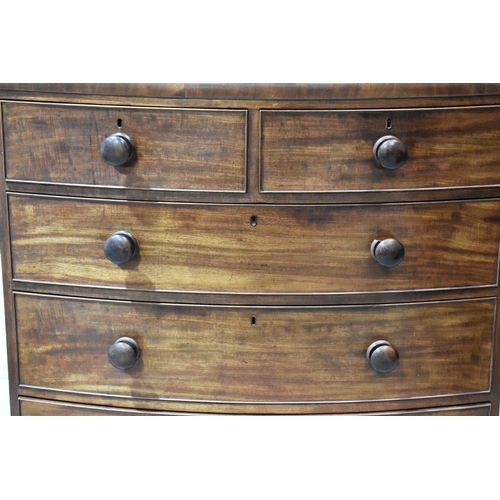 381 - A Victorian mahogany bow fronted chest of drawers with two over three graduating drawers and raised ... 