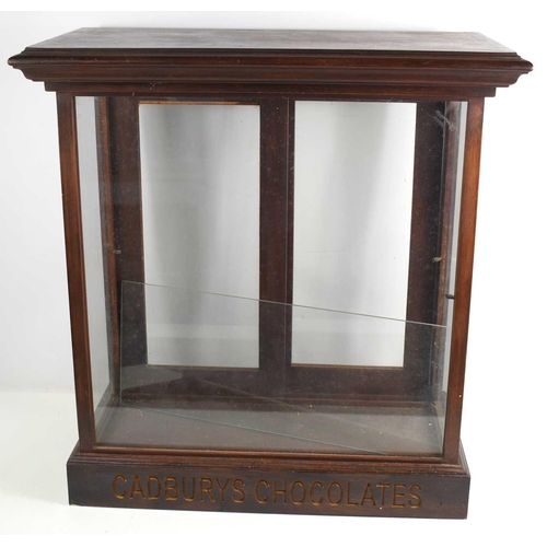 407 - A Victorian mahogany and glass countertop display case with later 