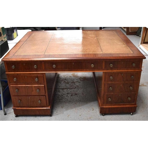 412 - A large 19th century mahogany twin pedestal partners desk with leather top, with nine drawers each s... 