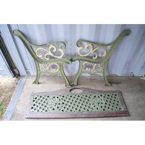 416 - A pair of vintage cast iron bench ends together with vintage cast iron and wooden back slat A/F.