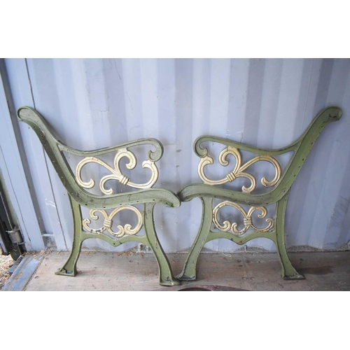 416 - A pair of vintage cast iron bench ends together with vintage cast iron and wooden back slat A/F.