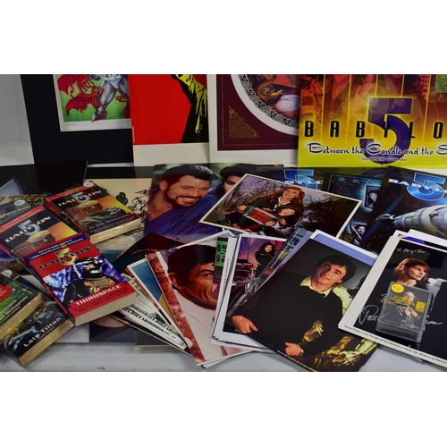 49 - A collection of Sci-fi memorabilia to include signed photos of Patricia Tillman, Peter Woodward and ... 