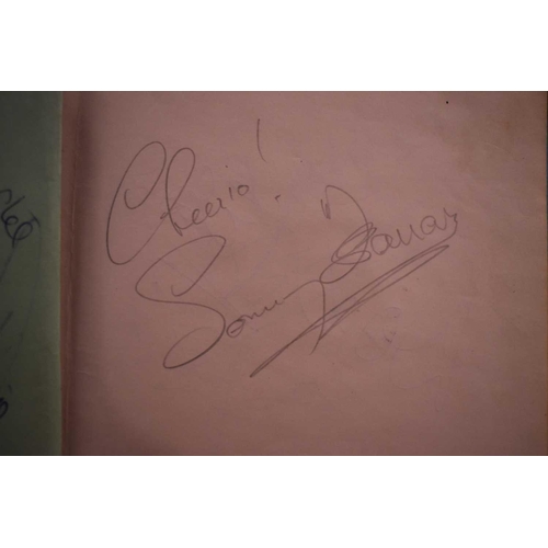 56 - Three autograph books containing the signatures of Adam Faith, Paul McCartney Vic Flick, Billy Burde... 