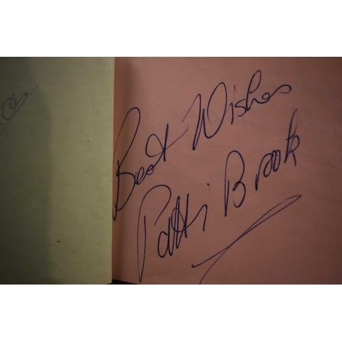 56 - Three autograph books containing the signatures of Adam Faith, Paul McCartney Vic Flick, Billy Burde... 