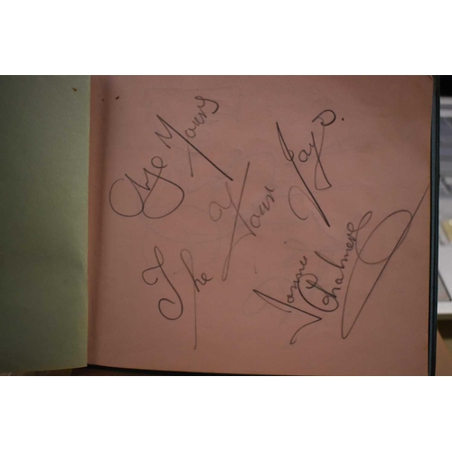 56 - Three autograph books containing the signatures of Adam Faith, Paul McCartney Vic Flick, Billy Burde... 