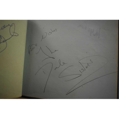 56 - Three autograph books containing the signatures of Adam Faith, Paul McCartney Vic Flick, Billy Burde... 