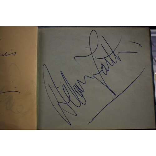 56 - Three autograph books containing the signatures of Adam Faith, Paul McCartney Vic Flick, Billy Burde... 