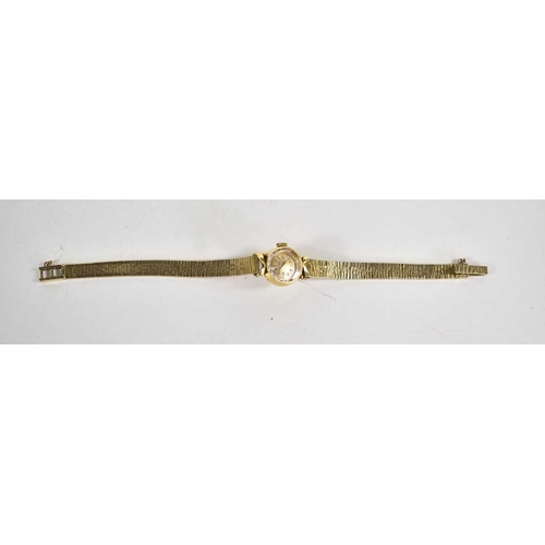 347 - An 18ct gold Vulcain ladies cocktail watch, baton dial, Swiss made, on an 18ct gold strap.