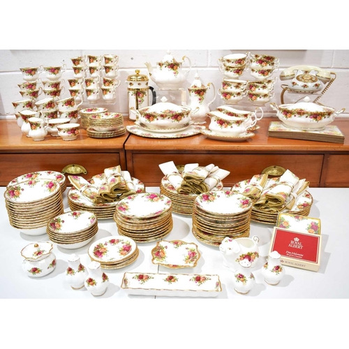 300 - A substantial Royal Albert Old Country Roses tea and dinner service, to include: 12 dinner plates, 1... 