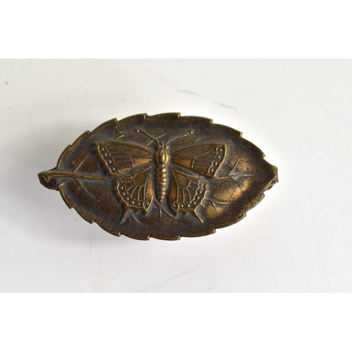 316 - A Victorian W. Avery & Son brass needle case, the top embossed with a butterfly.