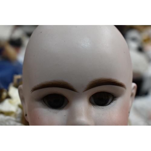 89 - An Etienne Denamur Depose bisque porcelain head bebe companion doll, no. 13, with composition body a... 