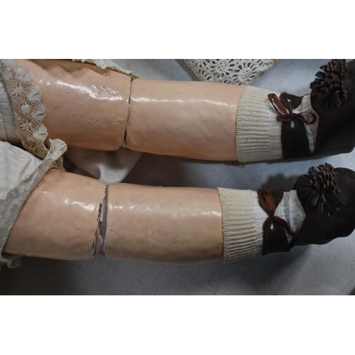 89 - An Etienne Denamur Depose bisque porcelain head bebe companion doll, no. 13, with composition body a... 