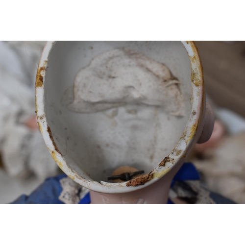 130 - A vintage Kestner doll with bisque socket head impressed 'R4D', heavy feathered brows, blue glass sl... 