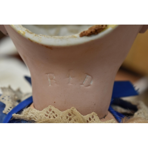 130 - A vintage Kestner doll with bisque socket head impressed 'R4D', heavy feathered brows, blue glass sl... 