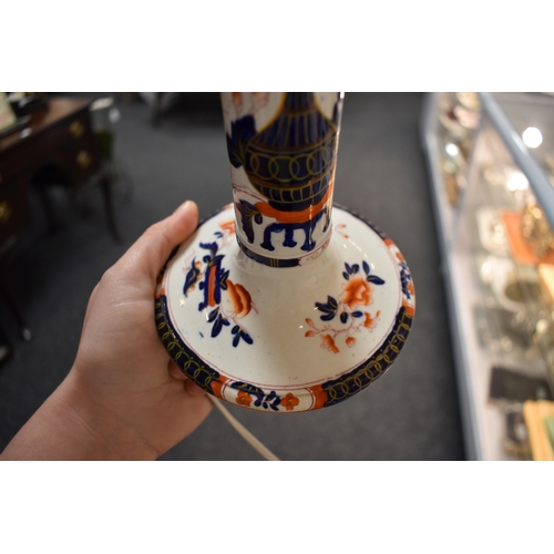 259 - A group of lamp bases, to include a large baluster form Chinese polychrome lamp base, together with ... 
