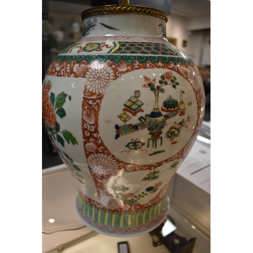 259 - A group of lamp bases, to include a large baluster form Chinese polychrome lamp base, together with ... 