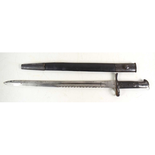 103 - A British 1875 pattern sawback bayonet and scabbard for Martini Henry Rifle, F.W stamped to the rica... 