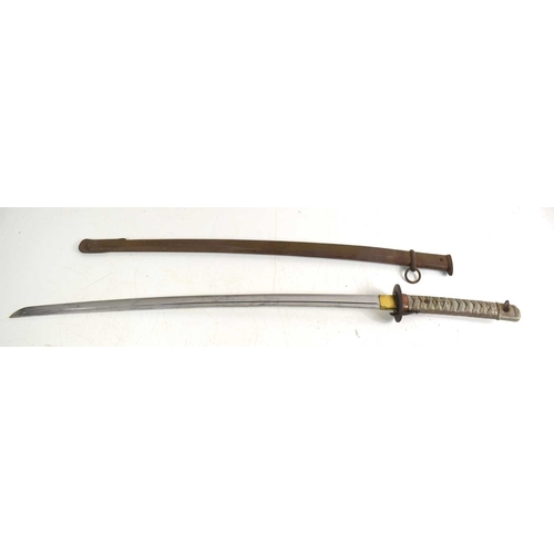 104 - A Japanese WWII NCO shin gunto sword, with brass shaped and pebbled tsuba above Kokura arsenal stamp... 