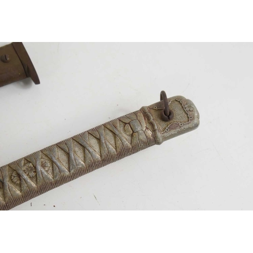 104 - A Japanese WWII NCO shin gunto sword, with brass shaped and pebbled tsuba above Kokura arsenal stamp... 
