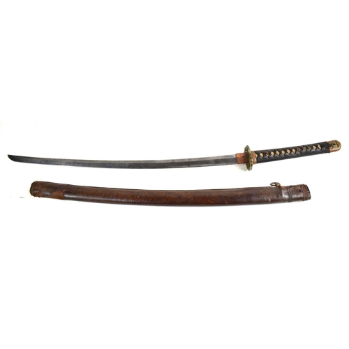 110 - A WWII era Japanese officers Shin Gunto Katana, the 68cm steel blade with undulating hamon, signed t... 