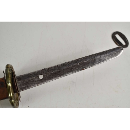 110 - A WWII era Japanese officers Shin Gunto Katana, the 68cm steel blade with undulating hamon, signed t... 