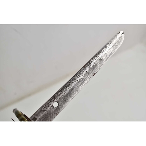 110 - A WWII era Japanese officers Shin Gunto Katana, the 68cm steel blade with undulating hamon, signed t... 
