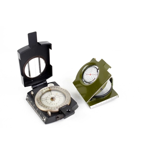 112 - A green Chinese Army PLA type 51/62 compass, and a black Steigung Wickie Prismatic sighting compass.... 