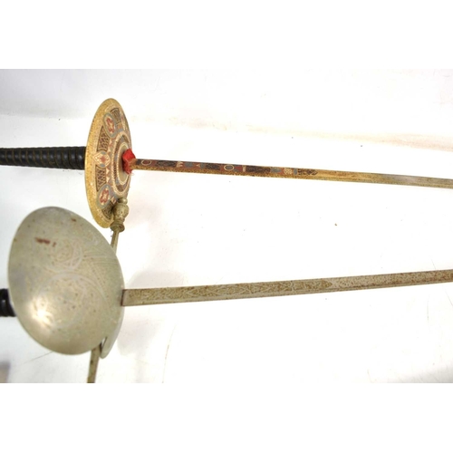 113 - A pair of walking canes, one bamboo with silver handle, 94cm, and another walking cane with horn han... 