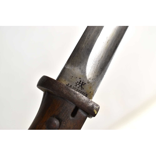 61 - Two German M1884/98 bayonets, one example made by J.A Henckels, the other blade stamped 4181 and S/1... 