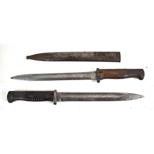 63 - A WWII era German model 1884/98 knife bayonet, the ricasso stamped GEBR Heller and Erfurt, with meta... 