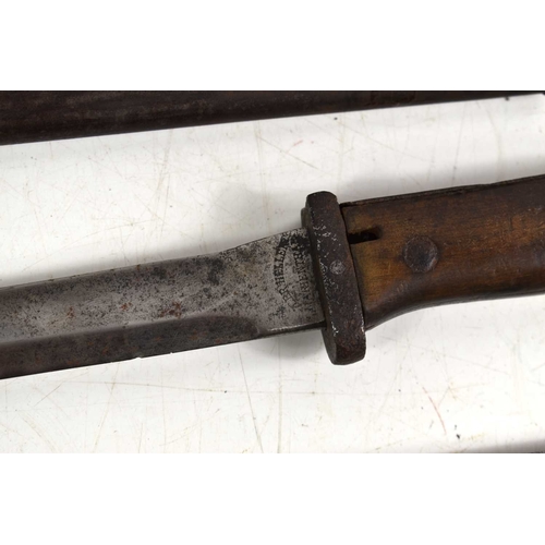 63 - A WWII era German model 1884/98 knife bayonet, the ricasso stamped GEBR Heller and Erfurt, with meta... 