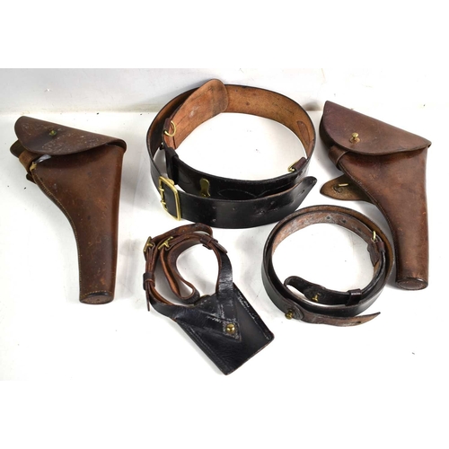 66 - Two WWI era leather pistol holsters for the Webley MKVI .455 pistol, together with a blackened Sam B... 