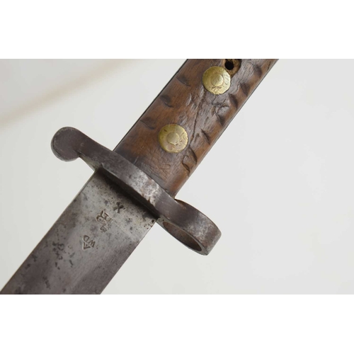 68 - A British 1888 pattern sword bayonet, the medial ribbed blade with blade spine stamped with 'crown 8... 