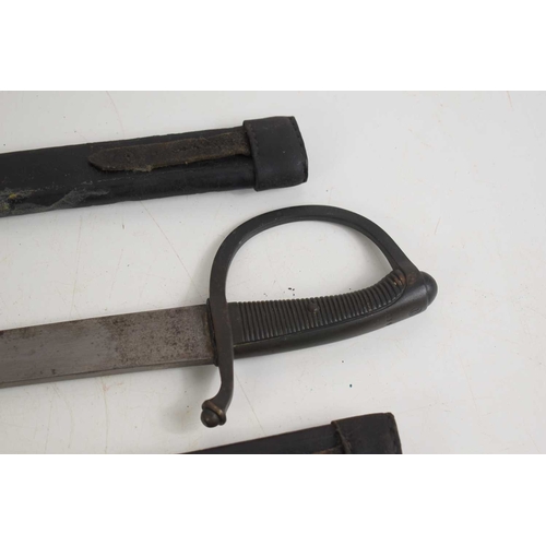 74 - Two French 19th century briquet sabre with D shaped knuckle guard, blade length 59cm, with leather s... 