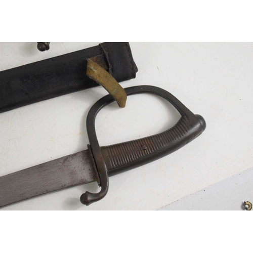74 - Two French 19th century briquet sabre with D shaped knuckle guard, blade length 59cm, with leather s... 