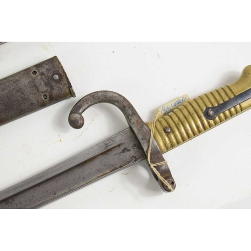 83 - A French model 1892 modified bayonet together with two French model 1866 chassepot bayonets, one exa... 