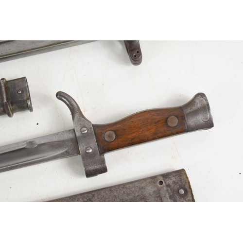 83 - A French model 1892 modified bayonet together with two French model 1866 chassepot bayonets, one exa... 