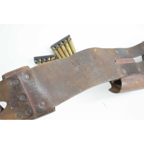 84 - A First World War 90 round leather bandolier for .303 rounds, the inside of the belt is stamped with... 
