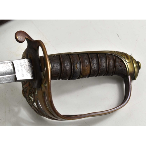 93 - A Victorian infantry officers sword by S.J Pillin of Gerrard Street, London, the pierced basket hilt... 