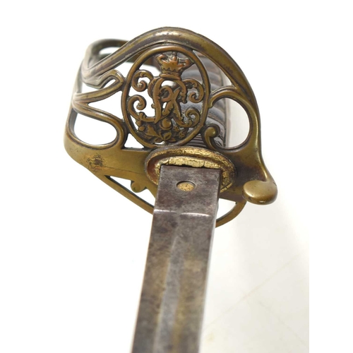 96 - A Victorian officer's sword by Henry Wilkinson, single edged fullered bladed with etched design, bra... 