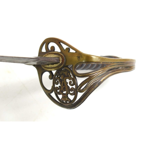 96 - A Victorian officer's sword by Henry Wilkinson, single edged fullered bladed with etched design, bra... 