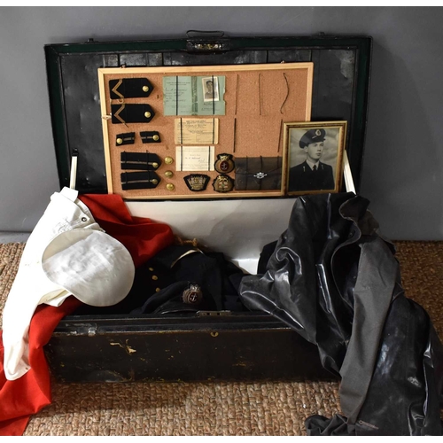 99 - A group of militaria relating to A.M Diarmid of the Merchant Navy, to include a metal travelling tru... 