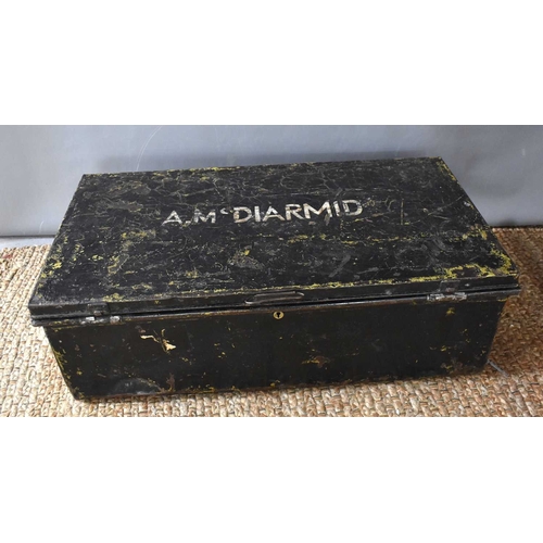 99 - A group of militaria relating to A.M Diarmid of the Merchant Navy, to include a metal travelling tru... 